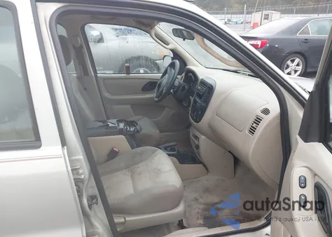 2003 Ford Escape Xls z USA, uszkodzony, nr VIN 1FMYU02113KC25514